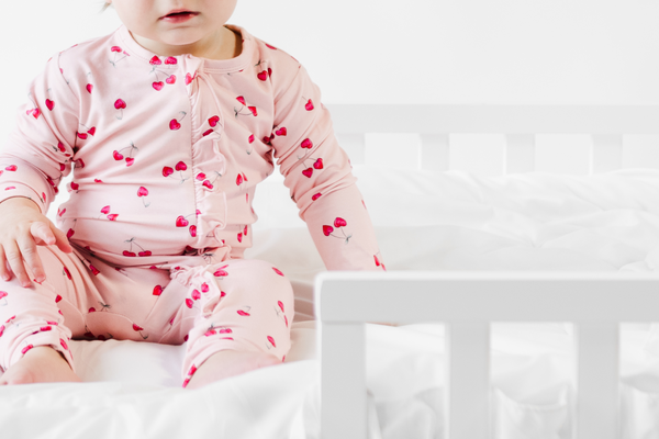 Ruffled Zipper Sleeper - PINK CHERRY HEART